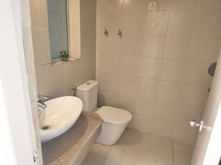 Bathroom, indiabulls-centrum-park 3 Bedroom 1650 Sq.Ft. Apartment In Sector 103 Gurgaon 10730468