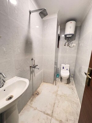 Bathroom in 2 BHK Builder Floor at Chattarpur – for Rent