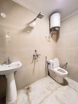 Bathroom in 2 BHK Builder Floor at Chattarpur – for Rent