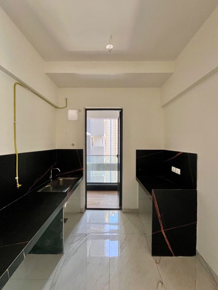Kitchen, raymond-the-invictus-by-gs 3 Bedroom 1550 Sq.Ft. Apartment In Pokhran Road No One Thane 10730502