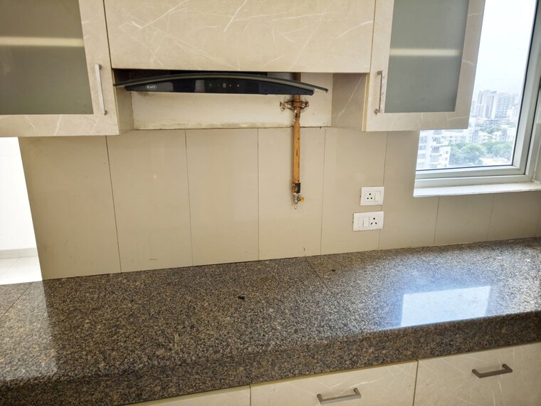 Kitchen, unitech-uniworld-gardens-2 2 Bedroom 973 Sq.Ft. Apartment In Sector 47 Gurgaon 10730524