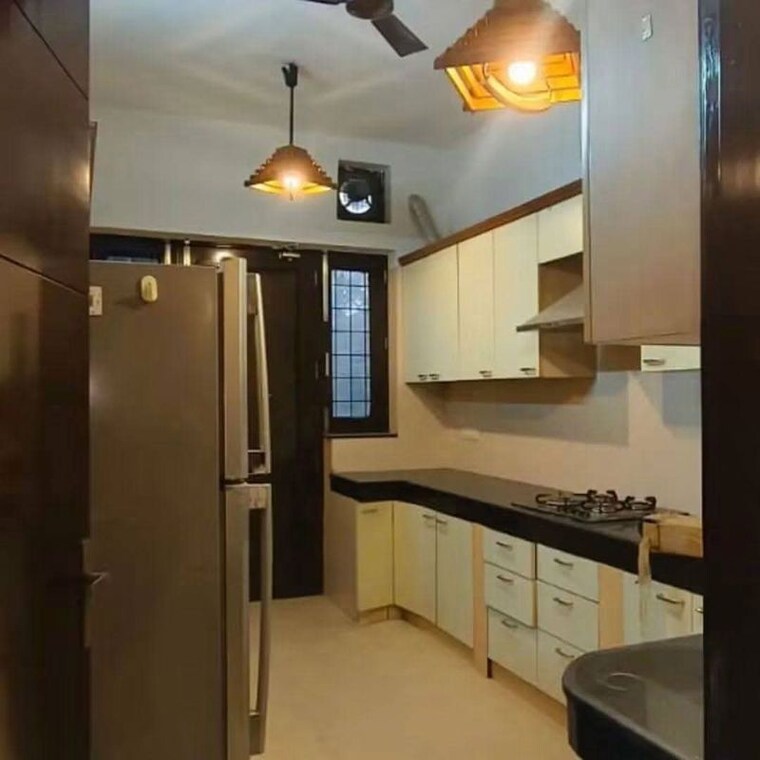 Kitchen, unitech-uniworld-gardens-2 2 Bedroom 973 Sq.Ft. Apartment In Sector 47 Gurgaon 10730544