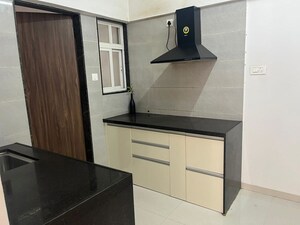Kitchen in 2 BHK Apartment at Choice Goodwill Breeza, Dhanori – for Rent