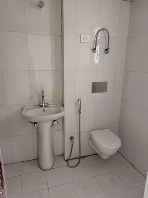 Washroom in 2 BHK Apartment at Shri Radha Aqua Garden, Sector 16b Greater Noida – for Sale