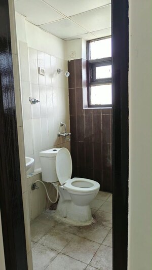 Bathroom in 2 BHK Apartment at RAS Palm Residency, Sector 76 – for Sale