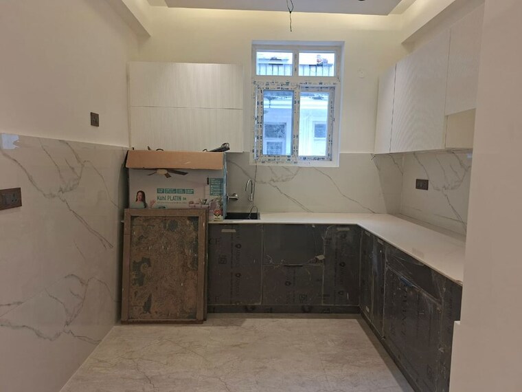 Kitchen, jaypee-green-sun-court-tower-iii 4 Bedroom 3850 Sq.Ft. Apartment In Jaypee Greens Greater Noida 10730724