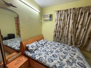 Bedroom in 1 BHK Apartment at Evershine Millennium Paradise, Kandivali East – for Rent