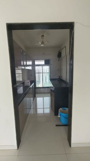 Kitchen in 2 BHK Apartment at Umang Shastri Nagar West View CHS, Goregaon West – for Rent