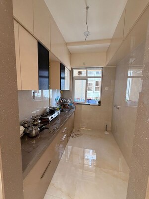 Kitchen in 2 BHK Apartment at Adarsh Nagar Society, Worli – for Rent
