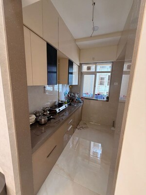 Kitchen in 2 BHK Apartment at Adarsh Nagar Society, Worli – for Rent