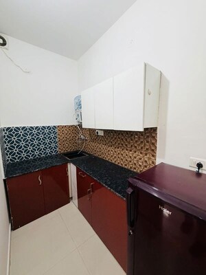 Kitchen in 1 RK Builder Floor at Sushant Lok I – for Rent