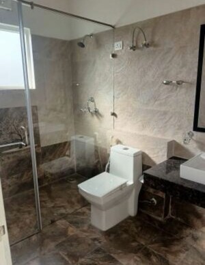 Bathroom in 4 BHK Apartment at Paramount Golf Foreste Apartments, Zeta I Greater Noida – for Rent