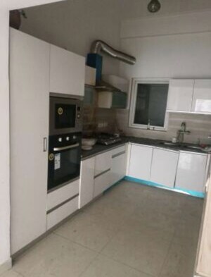 Kitchen in 4 BHK Apartment at Paramount Golf Foreste Apartments, Zeta I Greater Noida – for Rent