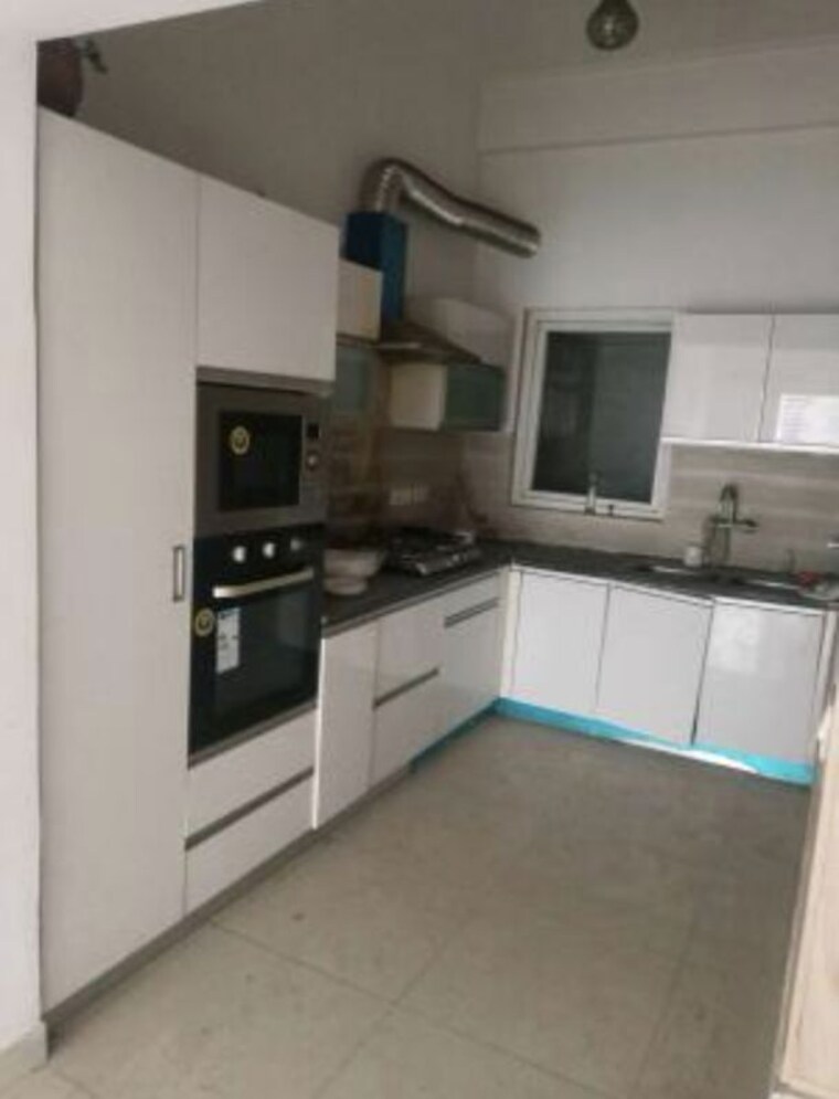 Kitchen, paramount-golf-foreste-apartments 4 Bedroom 2452 Sq.Ft. Apartment In Zeta I Greater Noida Greater Noida 10730976