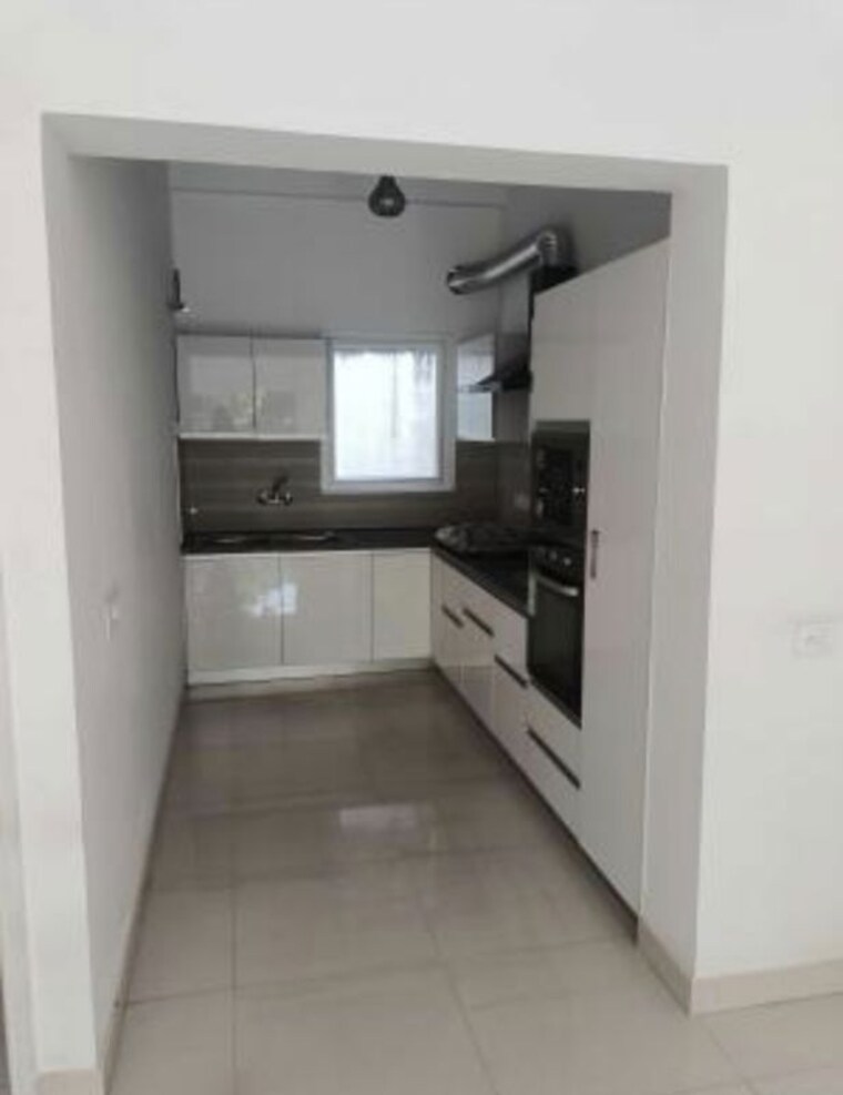 Kitchen, paramount-golf-foreste-apartments 4 Bedroom 2452 Sq.Ft. Apartment In Zeta I Greater Noida Greater Noida 10730976