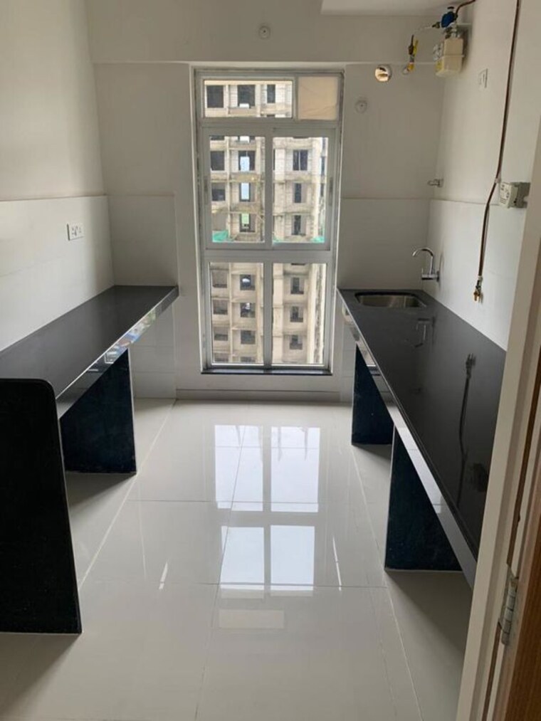 Kitchen, godrej-emerald 2 Bedroom 1000 Sq.Ft. Apartment In Ghodbunder Road Thane 10731069