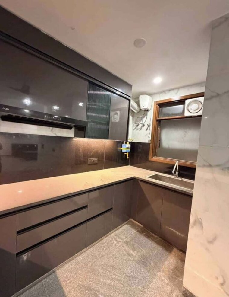 Kitchen, rajouri garden 3 Bedroom 160 Sq.Yd. Builder Floor In Rajouri Garden Delhi 10731096