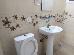 Washroom in 2 BHK Apartment at Prateek Wisteria, Sector 77 – for Rent