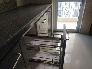 Kitchen in 2 BHK Apartment at Prateek Wisteria, Sector 77 – for Rent