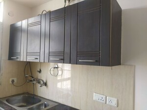 Kitchen in 2 BHK Apartment at Prateek Wisteria, Sector 77 – for Rent