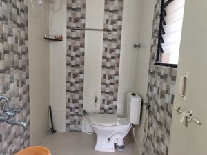 Bathroom in 3 BHK Apartment at Arun Sheth Sanskriti, Wakad – for Rent