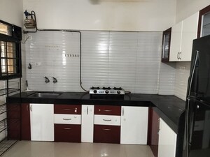 Kitchen in 3 BHK Apartment at Arun Sheth Sanskriti, Wakad – for Rent