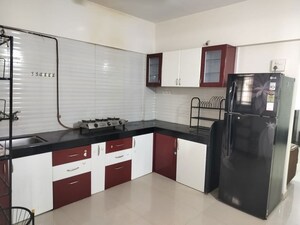 Kitchen in 3 BHK Apartment at Arun Sheth Sanskriti, Wakad – for Rent