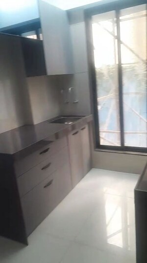Kitchen in 1 BHK Apartment at Unique Elanza, Mira Road – for Sale