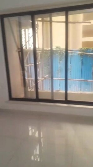 Living Room in 1 BHK Apartment at Unique Elanza, Mira Road – for Sale
