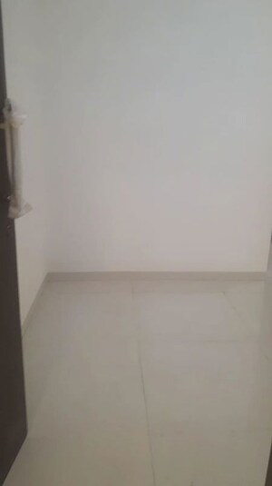 Living Room in 1 BHK Apartment at Unique Elanza, Mira Road – for Sale