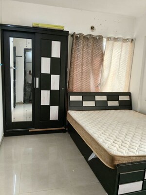 Bedroom in 2 BHK Apartment at Kumbare Fusion City, Kondhawe Dhawade – for Rent