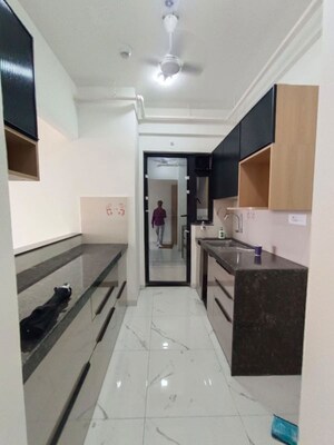 Kitchen in 2 BHK Apartment at Mahindra Nestalgia, Pimpri – for Rent