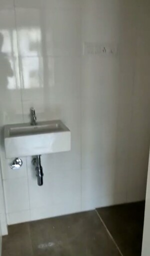 Bathroom in 1.5 BHK Apartment at Pratham 5TH Element, Andheri West – for Sale