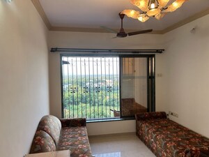 Living Room in 1 BHK Apartment at Kartikey Apartments, Kandivali West – for Rent