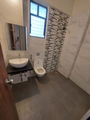 Bathroom in 5 BHK Apartment at Mantra Montana Phase 6, Dhanori – for Rent
