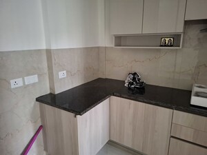 Kitchen in 2 BHK Apartment at Smart World Orchard, Sector 61 – for Sale