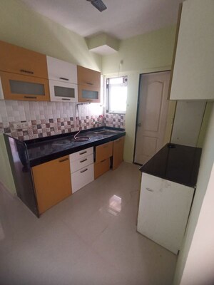 Kitchen in 1 BHK Apartment at Cosmos Enclave, Kasarvadavali – for Rent