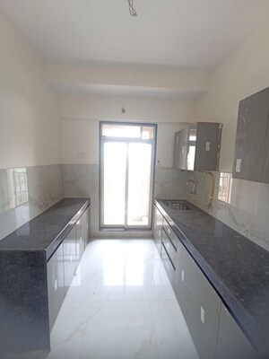 Kitchen in 1 BHK Apartment at Anant Metropolis Insignia Towers, Kasarvadavali – for Rent