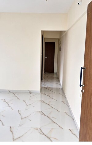 Living Room in 1 BHK Apartment at Ram Pushpanjali Residency, Owale – for Rent