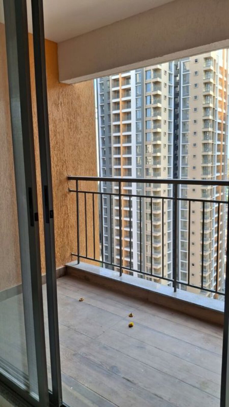 Balcony, pride-world-city-wellington 2 Bedroom 785 Sq.Ft. Apartment In Charholi Budruk Pune 10731607