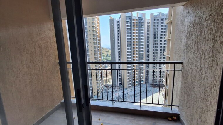 Balcony, pride-world-city-wellington 2 Bedroom 785 Sq.Ft. Apartment In Charholi Budruk Pune 10731607