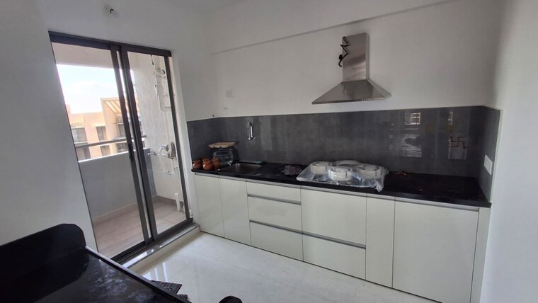 Kitchen, pride-world-city-wellington 2 Bedroom 785 Sq.Ft. Apartment In Charholi Budruk Pune 10731607
