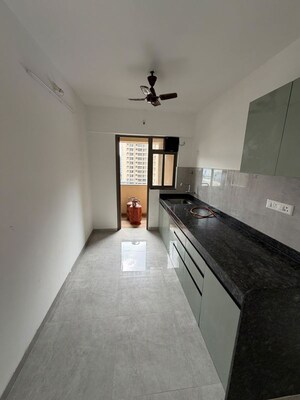 Kitchen in 3 BHK Apartment at Goel Ganga New Town, Dhanori – for Rent