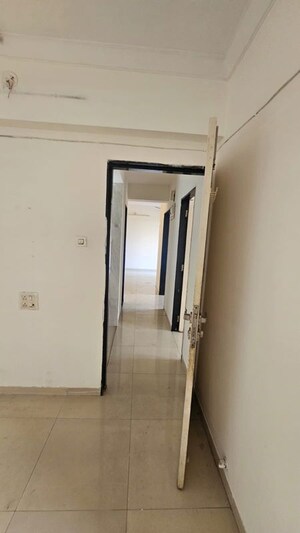 Building Lobby in 2 BHK Apartment at Arihant Aarohi, Padle – for Rent