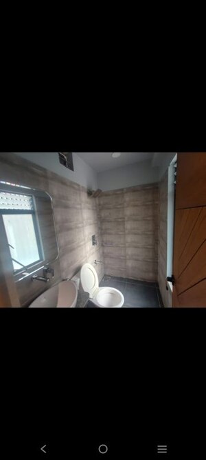 Bathroom in 3 BHK Apartment at Shivalik Sharda Park View, Shela – for Rent