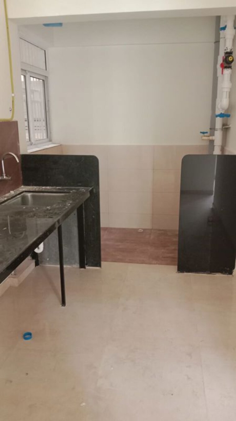 Kitchen, kolte-patil-life-republic 2 Bedroom 801 Sq.Ft. Apartment In Hinjewadi Pune 10731738