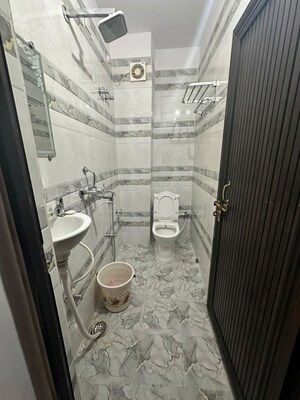 Bathroom in 2 BHK Apartment at Sigra – for Sale