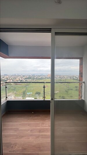 Bedroom in 2 BHK Apartment at Skyrise Sparkle, Dhanori – for Rent