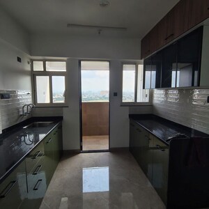 Kitchen in 2 BHK Apartment at Skyrise Sparkle, Dhanori – for Rent