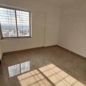 Room in 2 BHK Apartment at Skyrise Sparkle, Dhanori – for Rent
